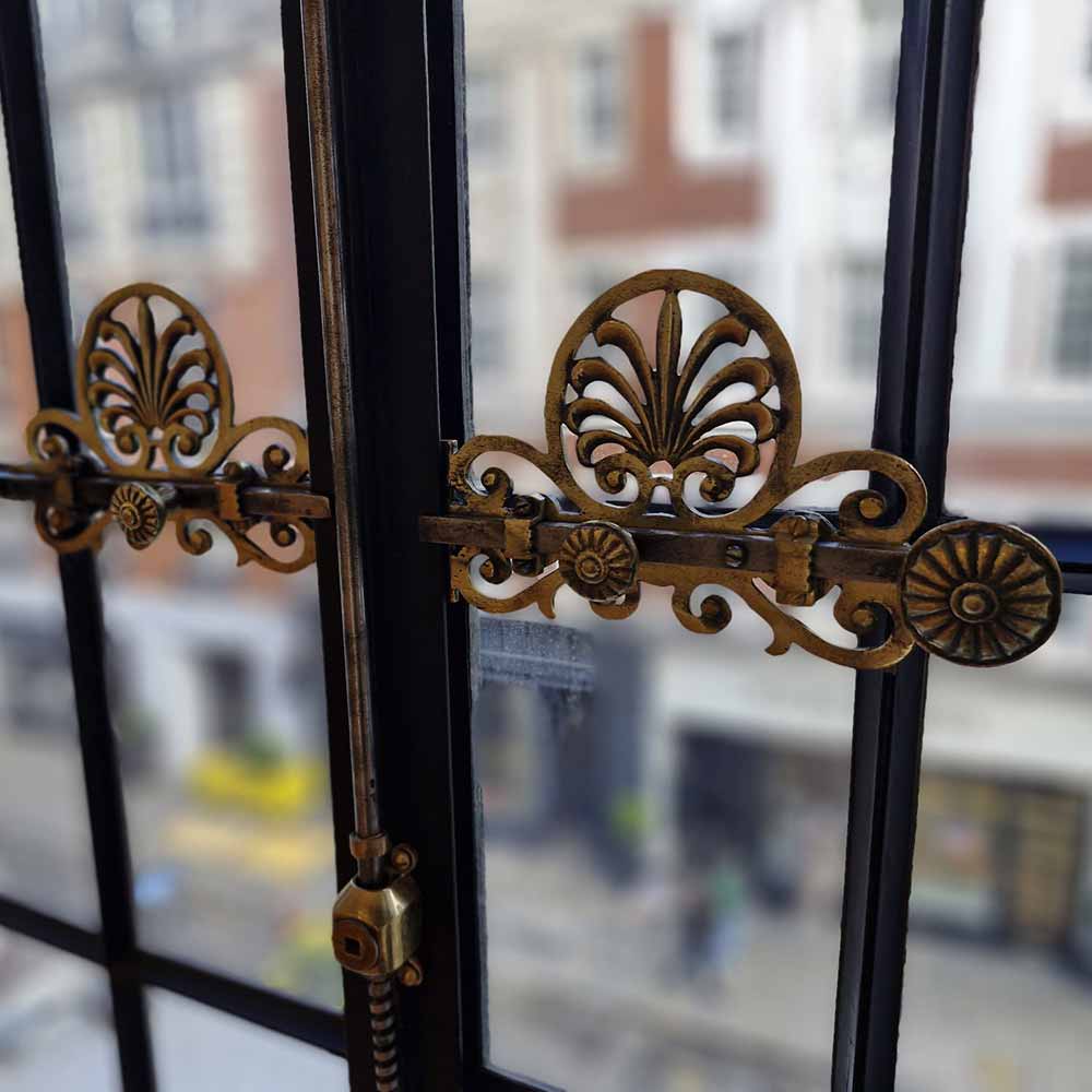 Brass ironmongery for traditional windows