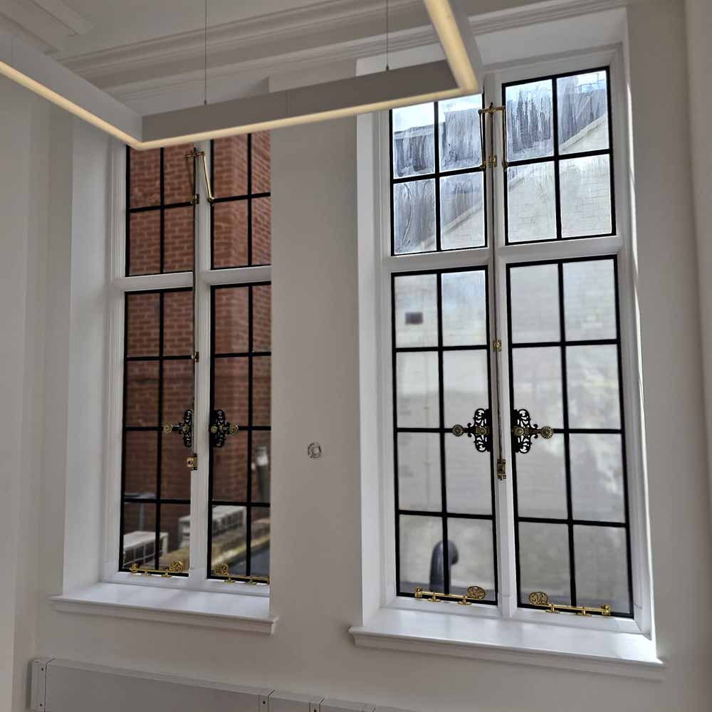 Two historic metal windows after restoration