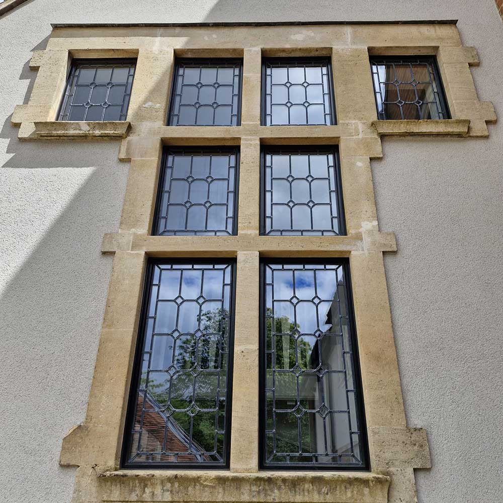 Period style house with bespoke t-shaped leaded light window with a diamond detail